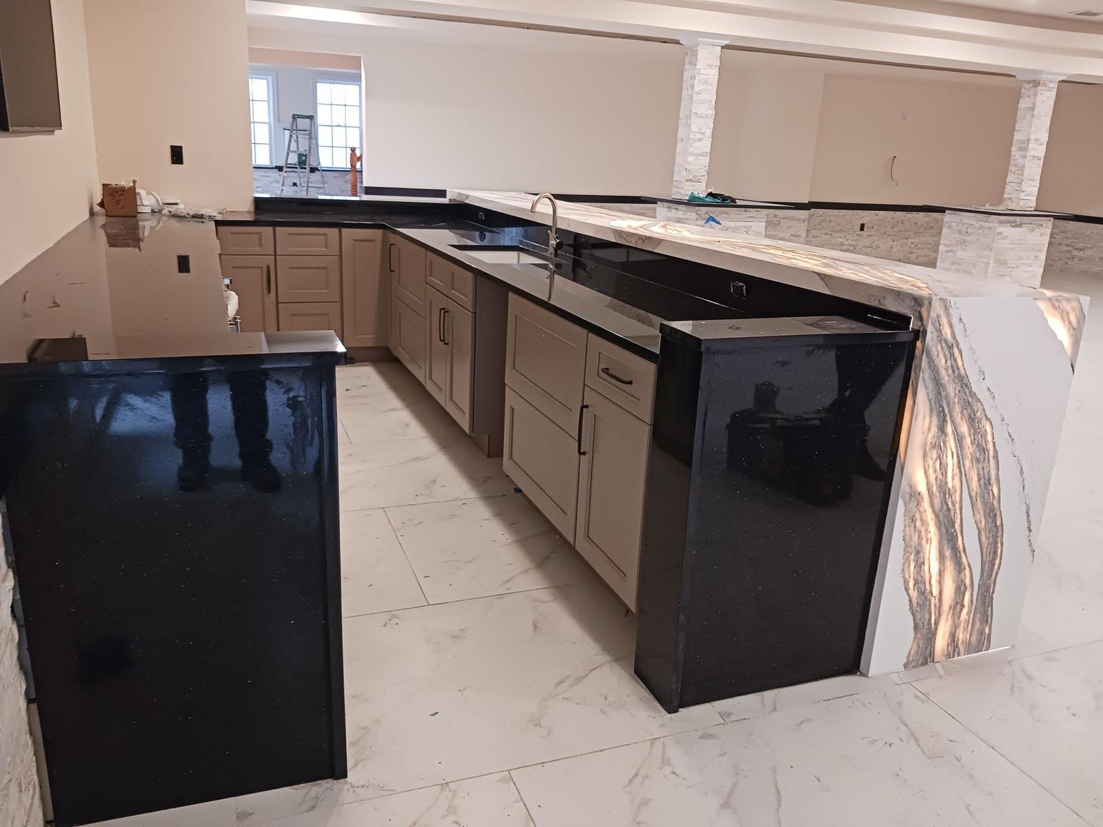 Mesone central de marmol clasico negro de cocina